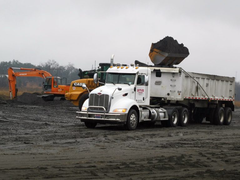 FILE - In a Feb. 26, 2014, file photo, coal ash is loaded into a truck at the Jefferies power generating station just outside Moncks Corner, S.C., operated by Santee Cooper, South Carolina's state-owned electric and water utility. On Monday, June 2, 2014, the Environmental Protection Agency proposed that South Carolina reduce carbon dioxide emissions from power plants by more than half by the year 2030. (AP Photo/Bruce Smith, File)