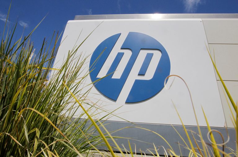 FILE - In this Aug. 21, 2012, file photo, the Hewlett-Packard Co. logo is seen outside the company's headquarters in Palo Alto, Calif. Hewlett-Packard Co. reports quarterly financial results after the market closes on Thursday, Feb. 20, 2014.  (AP Photo/Paul Sakuma, File)