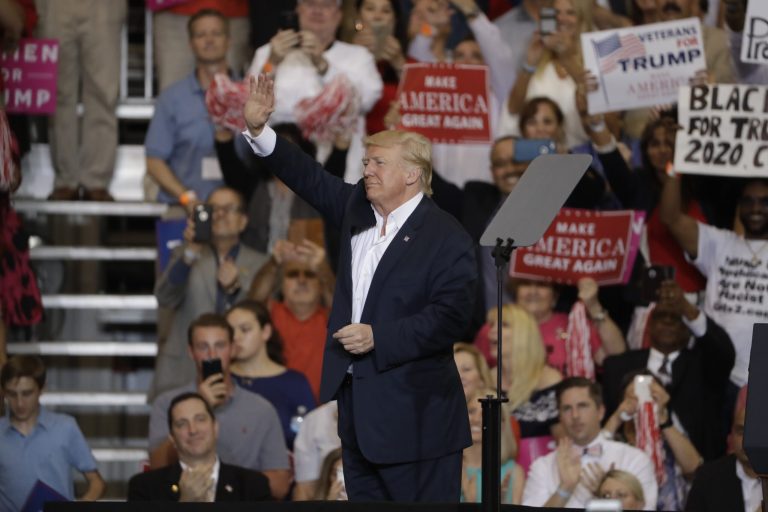 Three protesters from a Louisville rally last March alleged they were assaulted by Trump supporters after Trump yelled for them to leave. (AP Photo/Chris O'Meara)