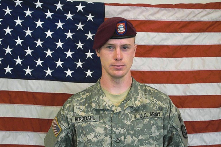 Sgt. Bowe Bergdahl poses in front of an American flag.  (Photo by U.S. Army via Getty Images)