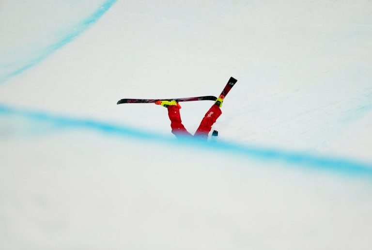 Brita Sigourney of the United States falls during women's ski halfpipe final at the Rosa Khutor Extreme Park, at the 2014 Winter Olympics, Thursday, Feb. 20, 2014, in Krasnaya Polyana, Russia. (AP Photo/Andy Wong)