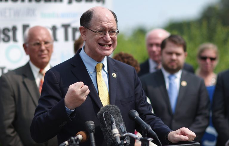Rep. Brad Sherman (D-Calif.), center, and fellow Democratic members of Congress hold a news conference to voice their opposition to the Trans-Pacific Partnership trade deal at the U.S. Capitol June 10, 2015 in Washington, D.C. The congressional Republican leadership announced that the House will vote as early as Friday to approve the TPP and give President Barack Obama fast-track authority to negotiate a large-scale trade deal. (Photo by Chip Somodevilla/Getty Images)