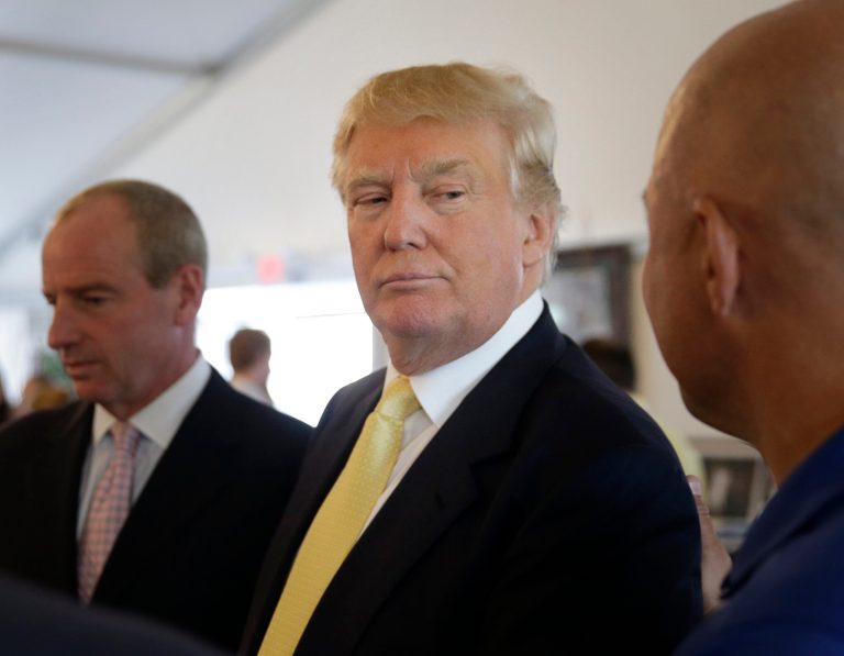 Republican presidential candidate Donald Trump arrives to a fundraising event at a golf course in the Bronx borough of New York, Monday, July 6, 2015. (AP Photo/Seth Wenig)