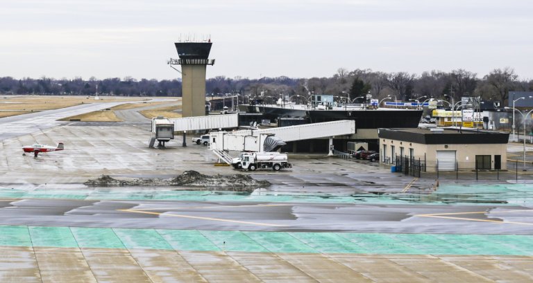 This April 3, 2014 photo shows The Coleman A Young Municipal airport in Detroit.  The aging airport get passenger service again if $28.5 million in funding is approved as part of the city's bankruptcy plan, officials said. The money for Coleman A. Young International Airport on the city's east side would pay to upgrade hangars and the airport's passenger terminal.  It also would fund a new loading bridge for passengers. (AP Photo/Detroit Free Press, Jarrad Henderson)  DETROIT NEWS OUT;  NO SALES