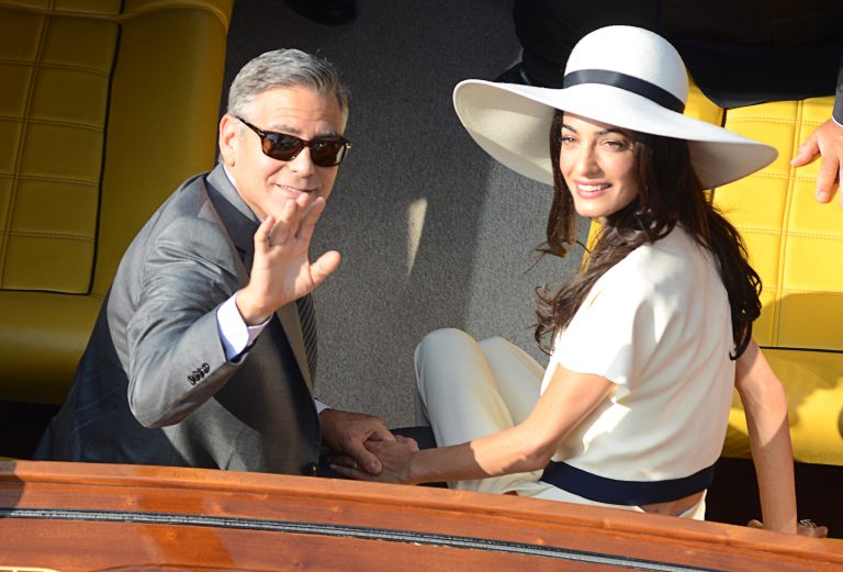 George Clooney and his wife Amal Alamuddin leave the city hall after their civil marriage ceremony in Venice, Italy, Monday, Sept. 29, 2014.Â 