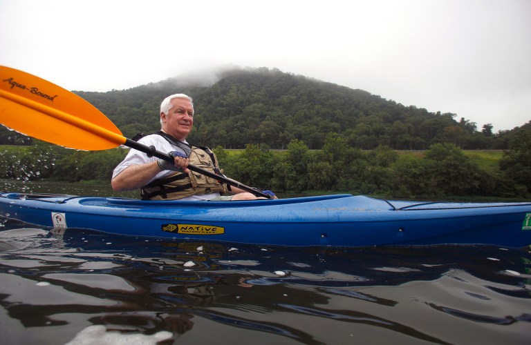 Pennsylvania Gov. Tom Corbett kayaks along the Juniata River, north of Harrisburg, Pa. on Thursday, Aug. 8, 2013. Corbett set off on a two-hour float on the river to promote tourism in Pennsylvania during an annual three-day event. (AP Photo/Philadelphia Inquirer, Luke Rafferty)