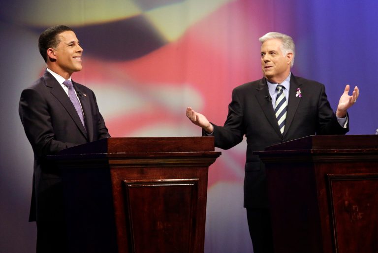 Maryland Democratic gubernatorial candidate, Lt. Gov. Anthony Brown, left, and Larry Hogan, Republican candidate for governor, hold a debate at Maryland Public Television's studios in Owings Mills, Md., Saturday, Oct. 18, 2014. (AP Photo/Patrick Semansky, Pool)