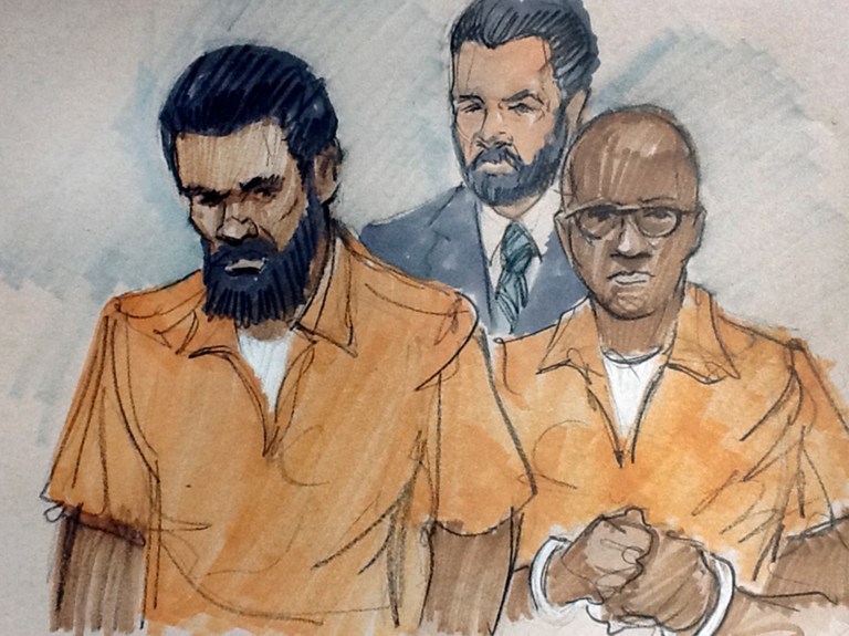 In this courtroom sketch, Jonas M. Edmonds, left, and Hasan R. Edmonds, right, stand in front of an FBI agent as they appear at a hearing at federal court in Chicago, Thursday, March 26, 2015, following their arrests Wednesday on charges of conspiring with the Islamic State group. (AP Photo/Tom Gianni)