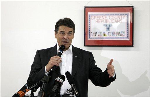 In Iowa, Perry rips RomneyCare
