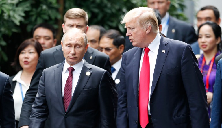 President Trump and Russian President Vladimir Putin talk during the APEC Summit in Danang, Vietnam.