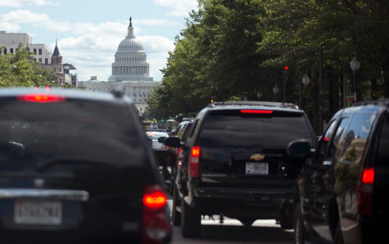President Barack Obama's motorcade moves up Pennsylvania Ave. in the direction of the U.S. Capitol, center, Saturday, Sept. 14, 2013, in Washington, en route to Andrews Air Force Base to golf. After days of intense negotiations, the United States and Russia reached agreement Saturday on a framework to secure and destroy Syria's chemical weapons by mid-2014 and impose U.N. penalties if the Assad government fails to comply. Obama made clear that 