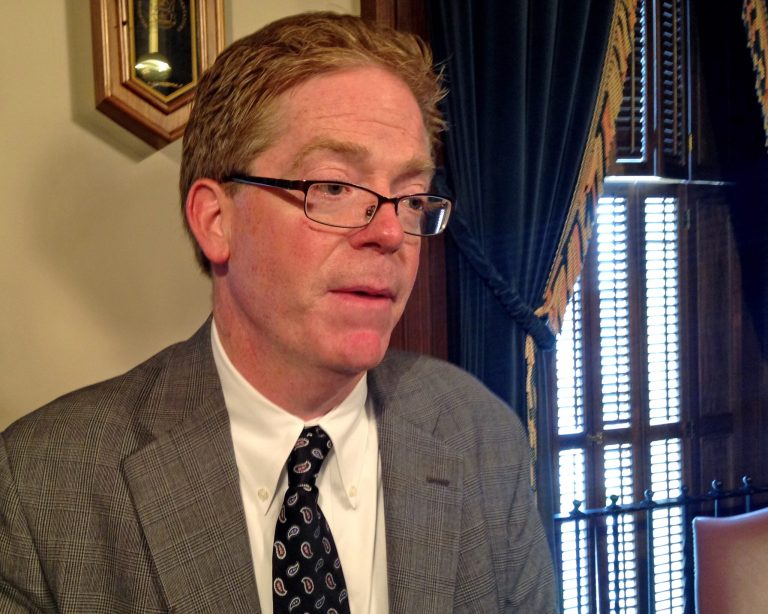 Rep. John Walsh, R-Livonia, who chaired a special committee tasked with considering Detroit bankruptcy-related legislation, speaks with reporters after the panel approved the 11-bill package on Wednesday, May 21, 2014 in Lansing, Mich. The legislation would give $195 million in state money to help shield Detroit retirees from steep pension cuts and prevent the sale of valuable city-owned art. Gov. Rick Snyder wants the bills on his desk in June. [AP Photo/David Eggert]