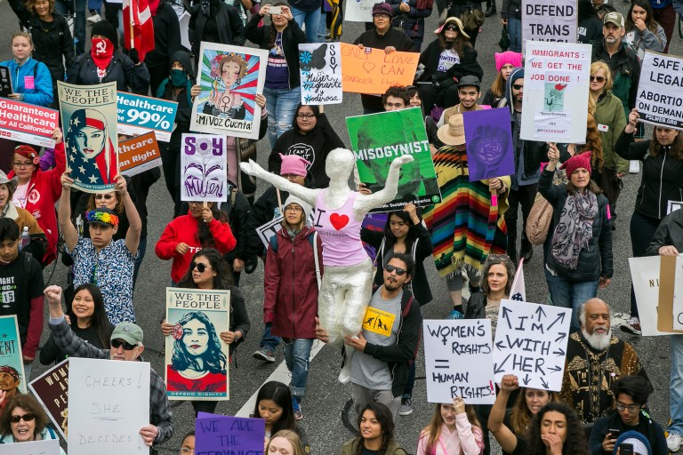 According to the school district, 300 staff members requested Wednesday off specifically to honor International Women's Day. (AP Photo/Damian Dovarganes)