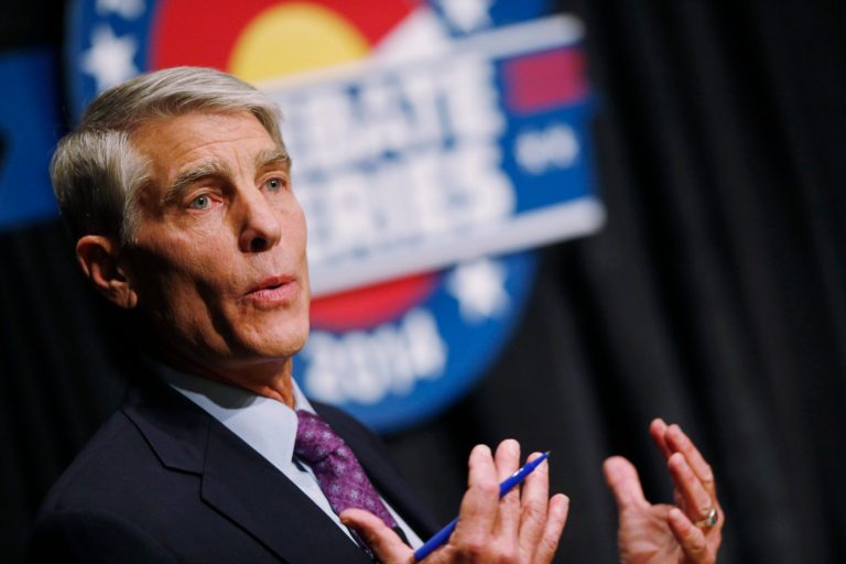 Sen. Mark Udall, D-Colo., makes point during senatorial debate with Republican challenger U.S. Rep. Corey Gardner in Denver on Tuesday. (AP/David Zalubowski)
