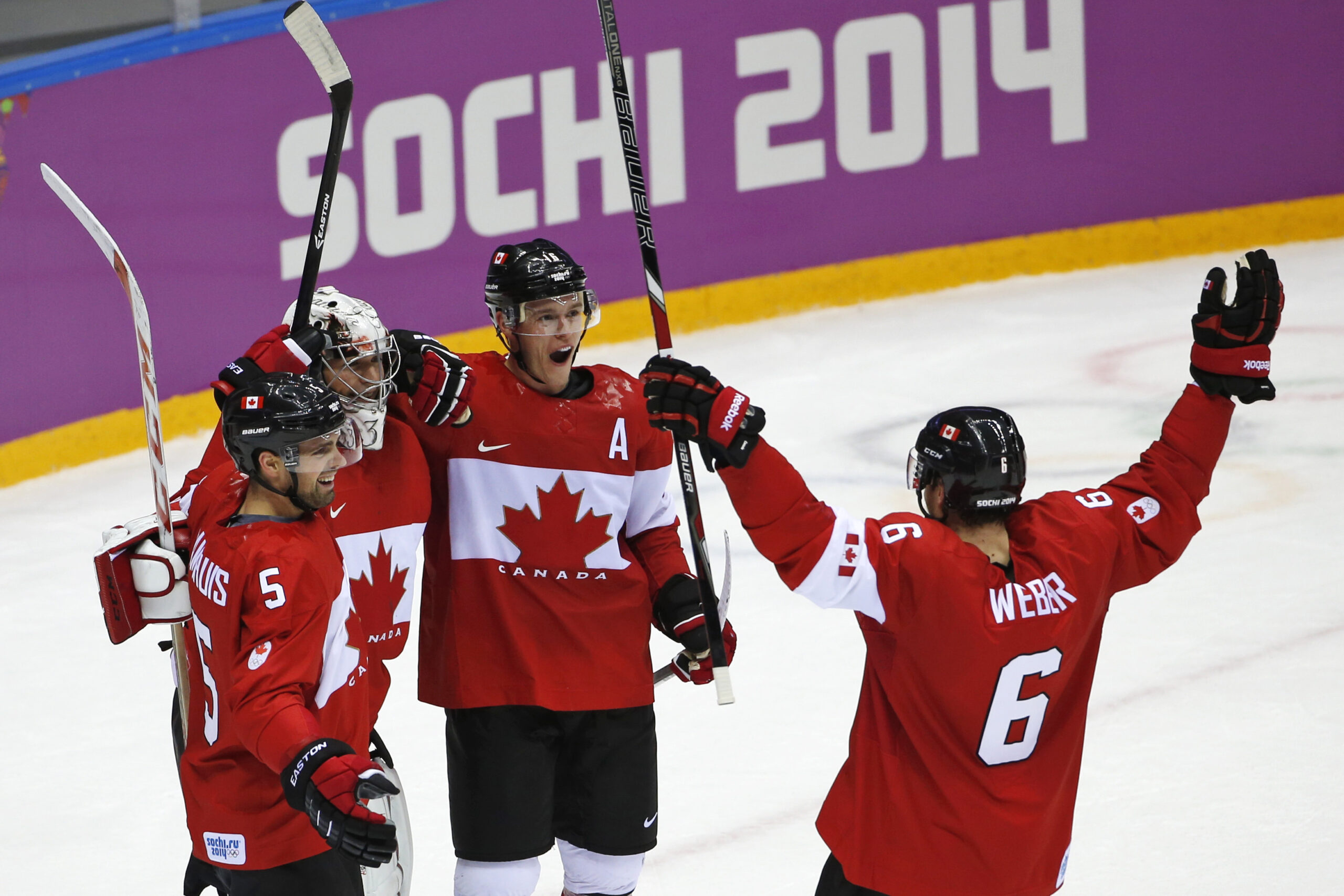 Canadians rule hockey as Olympic flame fades