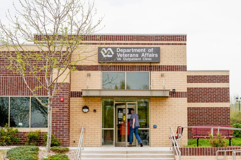 A man visits the Department of Veterans Affairs Outpatient Clinic in Fort Collins, Colo., Monday, May 5, 2014. Employees at the clinic were instructed to falsify records to make it appear that patients were getting appointments close to the day requested, government investigators said. (AP Photo/The Coloradoan, Erin Hull)