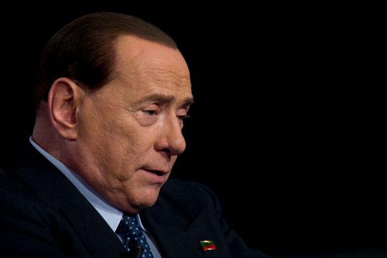 FILE -- In this file photo taken in Rome on May 21, 2014, former Italian Premier and Forza Italia (Go Italy) party leader Silvio Berlusconi talks during the recording of a tv-talk show. An Italian court on Friday was considering its decision on former Premier Silvio Berlusconi's appeal against a sex-for-hire case that revealed details of raunchy, sex-fueled bunga-bunga parties at his private villa attended by a bevy of aspiring showgirls. Berlusconi was sentenced to seven years in jail and handed a lifetime political ban after being convicted last year of paying for sex with an underage prostitute and then using his influence to cover it up. He denies the charges. (AP Photo/Andrew Medichini)