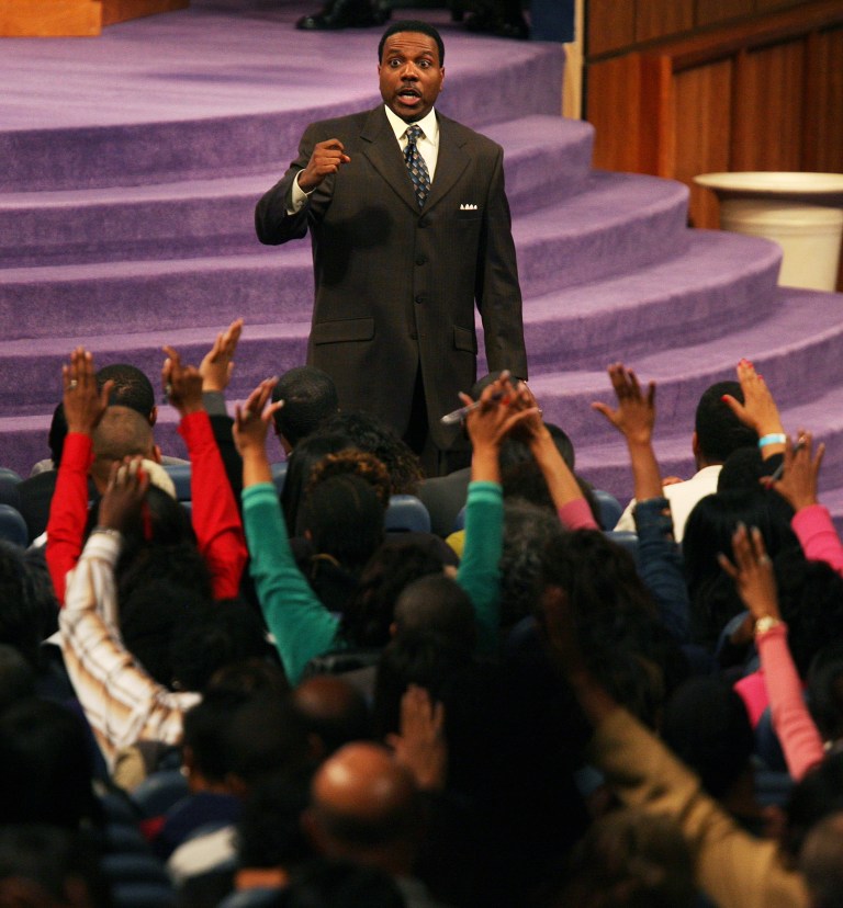   In this Wednesday, Nov. 7, 2007 photo, Rev. Creflo Dollar gives his Wednesday night service at World Changers Church International, in College Park, Ga. Dollar has been arrested after authorities say he slightly hurt his 15-year-old daughter in a fight at his metro Atlanta home. Fayette County Sheriff's Office investigator Brent Rowan says deputies responded to a call of domestic violence at the home around 1 a.m. Friday, June 8, 2012. Rowan says the 50-year-old pastor and his daughter were arguing over whether she could go to a party when Dollar 