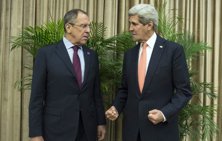 Secretary of State John Kerry on Friday told Russian Foreign Minister Sergei Lavrov that the U.S. isn't happy that a Russian military plane buzzed a U.S. destroyer this week. (AP Photo/Nicholas Kamm, Pool)