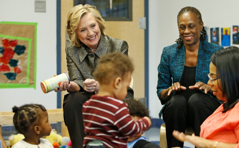 Hillary Clinton, left, and New York City first lady Chirlane McCray visit a classroom for children seven to 18 months at FirstStepNYC, an early childhood development center on April 1, 2015 in the Brooklyn borough of New York City. (Photo by Kathy Willens-Pool/Getty Images)