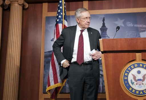 Senate Majority Leader Harry Reid, D-Nev., prepares to speak with reporters about the federal budget on Capitol Hill in Washington, Thursday, March 14, 2013. (AP Photo/Cliff Owen)