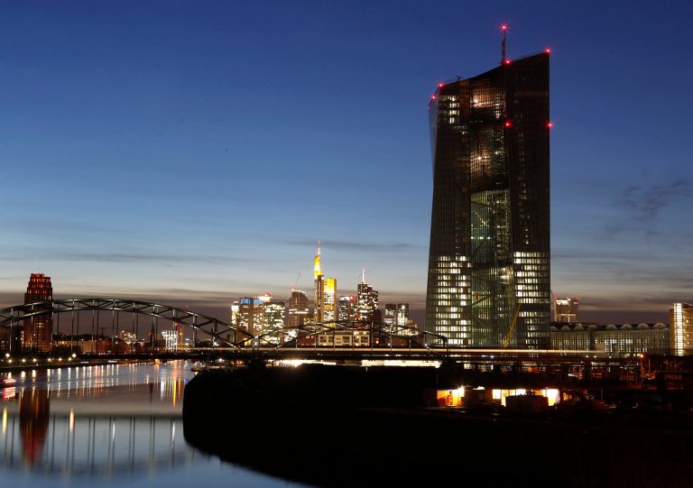 The new headquarters of the European Central Bank (ECB), building at right, is under construction on the water front of the River Main,in Frankfurt, Germany, Monday, Feb. 24, 2014. The ECB is supposed to move into the building at the end of 2014. (AP Photo/Michael Probst)
