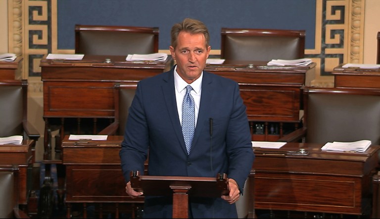 Flake was already facing a tough primary challenge from inside his own party while also fending off attacks from Trump, who was frustrated by Flake's refusal to jump in line behind the president without question. (Senate TV via AP)