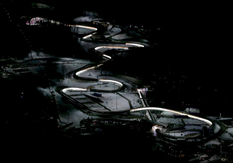 The Sanki Sliding Center is seen from a gondola after the men's luge competition in the 2014 Winter Olympics, Saturday, Feb. 8, 2014, in Krasnaya Polyana, Russia. (AP Photo/Charlie Riedel)