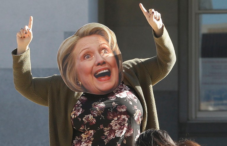 Former Democratic nominee Hillary Clinton made GQ magazine's list of 2016's least influential people. Above, a Hillary Clinton supporter wears a Hillary mask. (AP Photo/Rich Pedroncelli)