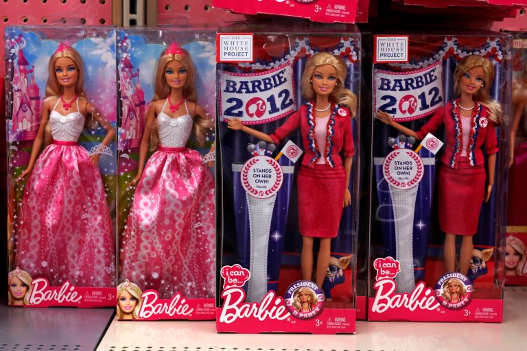 In this Tuesday, Jan. 28, 2014, photo, Barbie dolls, a Mattel product, are displayed in a Walmart store in Robinson Township, Philadelphia. Mattel Inc. reports quarterly financial results before the markets open on Friday, Jan. 31, 2014.