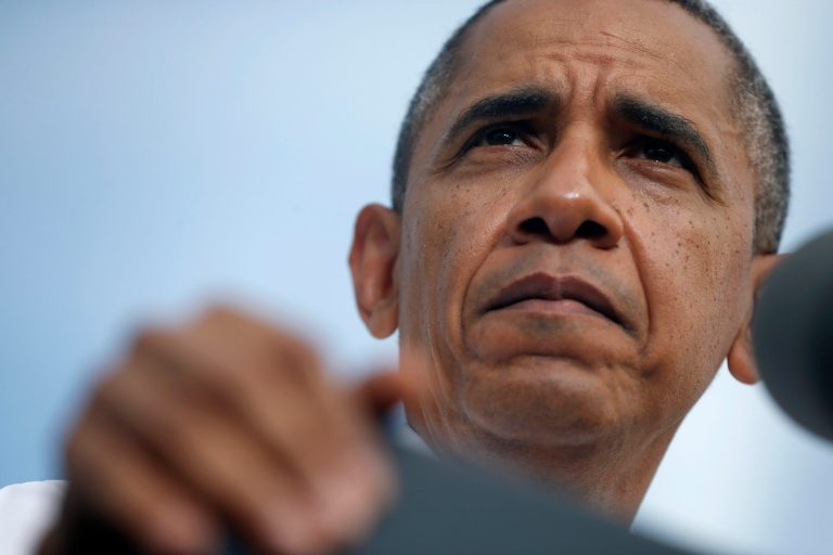 President Barack Obama speaks about the government shutdown and debt ceiling during a visit to M. Luis Construction, which specializes in asphalt manufacturing, concrete paving, and roadway reconstruction, Thursday, Oct. 3, 2013, in Rockville, Md. (AP Photo/Charles Dharapak)