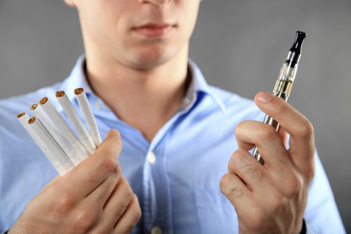 Electronic cigarettes give smokers a nicotine fix without the stink, tar, fire or carbon monoxide of real cigarettes, but pharmaceutical companies with competing products would like to curtail the e-cig industry. (Photo: Thinkstock)ÃÂ 