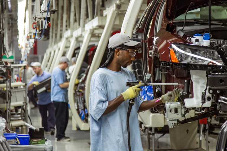 Workers assemble Volkswagen Passat sedans at the German automaker's plant in Chattanooga, Tenn. (AP/ Erik Schelzig)