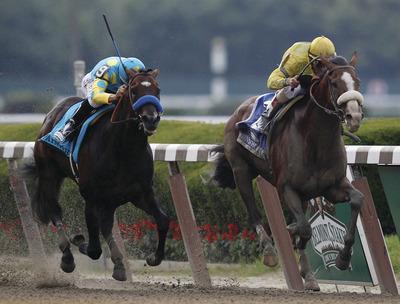Rob Carr/Getty Images
After finishing seventh at the Kentucky Derby, Union Rags, right, won the Belmont Stakes on Saturday.