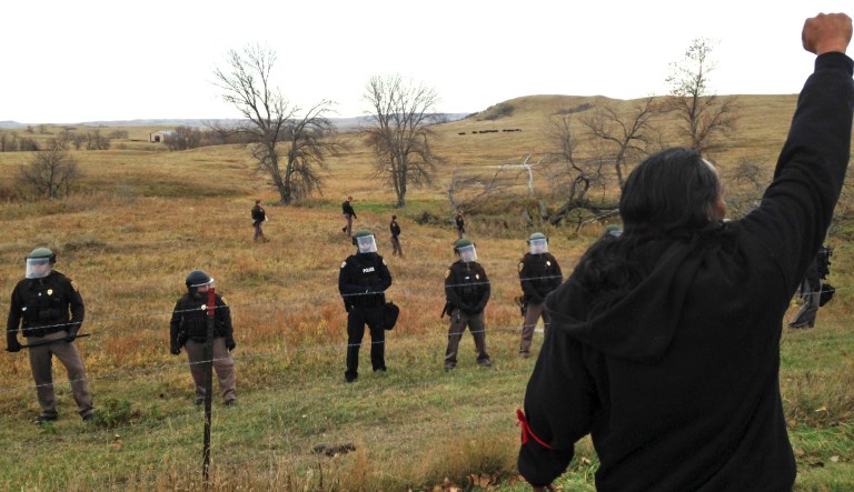 Lawmakers' letter to Attorney General Jeff Sessions raises security concerns based on an incident last year in which a group of environmental activists attempted to disable pipelines that crossed the border between the U.S. and Canada. The trial for one of the activists began last month. (AP Photo/James MacPherson)