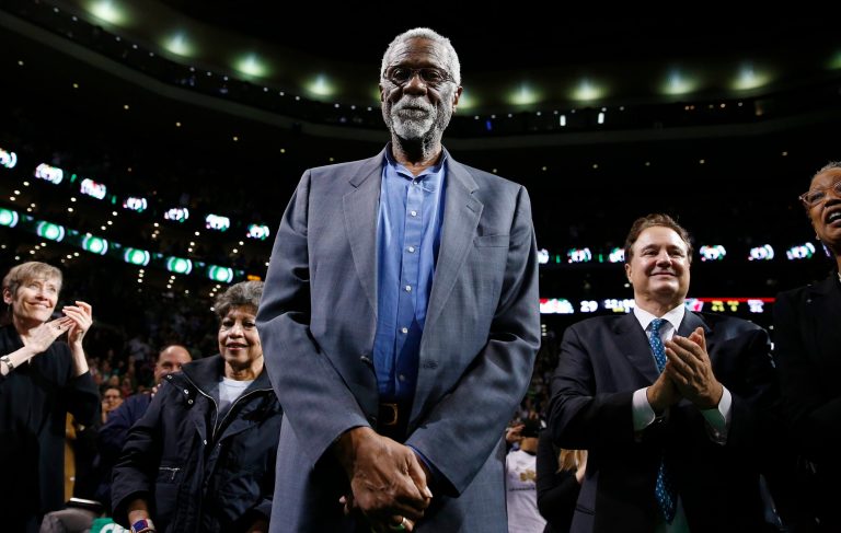 Boston Celtics legend Bill Russell stands courtside during a tribute in his honor during an NBA basketball game against the Milwaukee Bucks in Boston on Nov. 1. (AP Photo/Michael Dwyer)