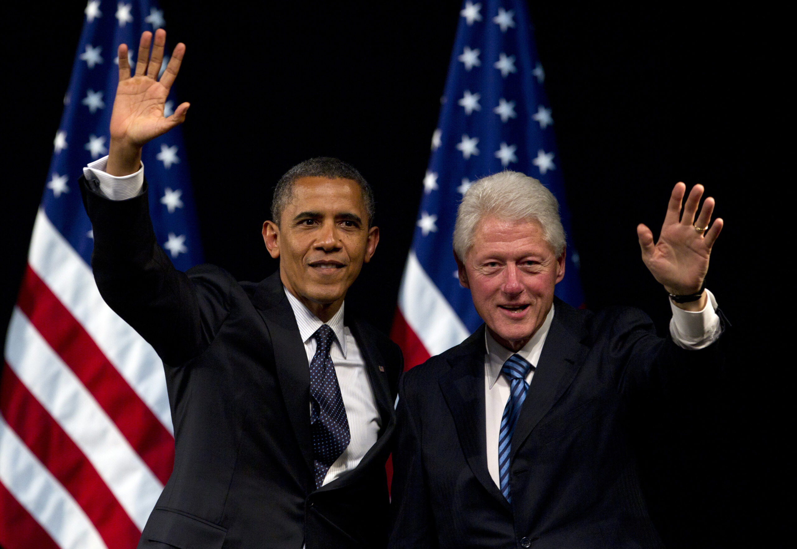 THE RACE: Obama follows Wisconsin vote from afar
