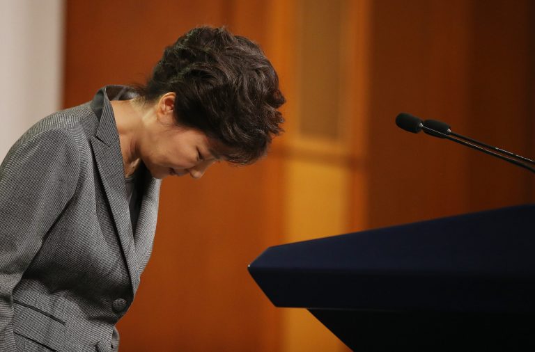 South Korean President Park Geun-hye bows after delivering a speech to the nation about the sunken ferry Sewol at the presidential Blue House in Seoul, South Korea, Monday, May 19, 2014. South Korea's president announced plans Monday to disband the coast guard and root out corruption and collusion between regulators and shipping companies that furious citizens believe led to a ferry disaster last month that left more than 300 people dead or missing. (AP Photo/Yonhap, Ahn Jung-won) KOREA OUT