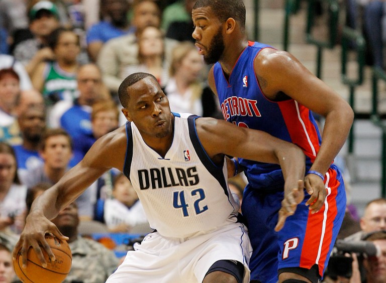   Dallas Mavericks forward Elton Brand (42) battles Detroit Pistons center Greg Monroe (10) for space during the first half of an NBA basketball game, Saturday, Dec. 1, 2012, in Dallas. (AP Photo/Brandon Wade)  