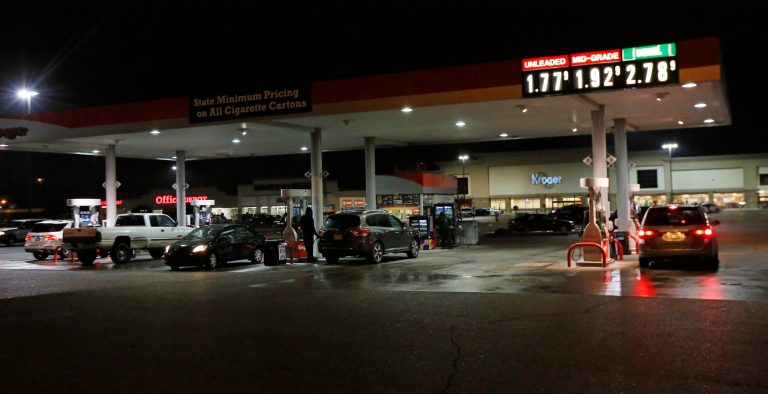 Late evening drivers take advantage of low prices to fill their tanks in Jackson, Miss., Friday, Jan. 23, 2015. Gas prices in Mississippi are among the lowest in the country. (AP Photo/Rogelio V. Solis)