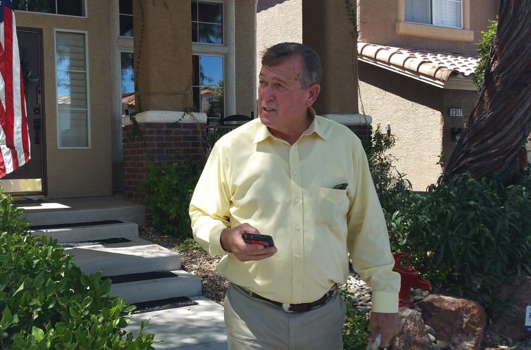 In this July 20, 2016 photo, Rep. Cresent Hardy visits homes in Las Vegas to talk to voters. The Republican congressman faces a tough re-election bid in a district that leans Democratic. (AP Photo/Michelle Rindels)