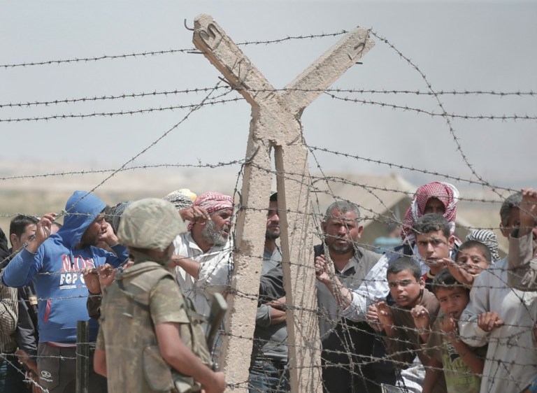 Human Rights Watch alleged Turkish guards have regularly used excessive force when dealing with asylum seekers and smugglers. (AP Photo)