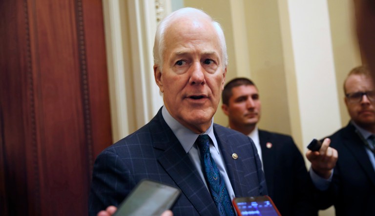 Senate Majority Whip Sen. John Cornyn, R-Texas, speaks to reporters. He, along with other Senate Republican leaders, are trying to get more of their senators to vote for the tax reform bill. Cornyn said he expected to pass the final bill Tuesday. (AP Photo/Jacquelyn Martin)