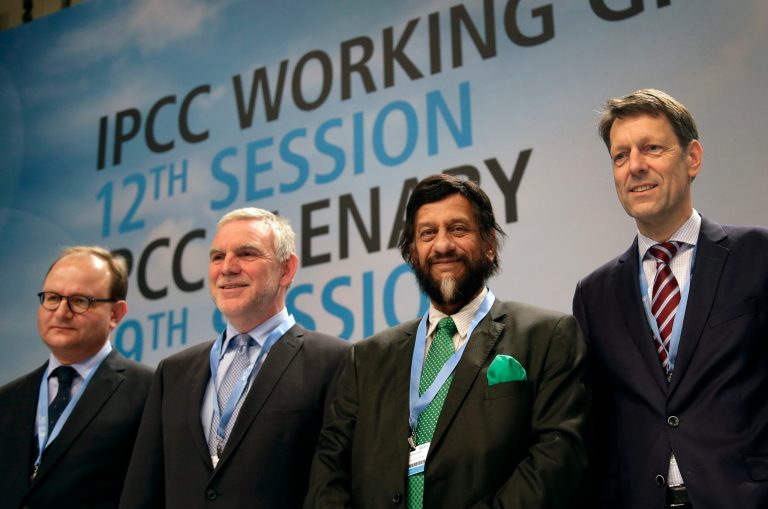 Ottmar Edenhofer, co-chairman of the IPCC Working Group III, Jochen Flasbarth, state secretary of the German Enviroment Ministry, Rejendra K. Pachauri, chairman of the IPCC, and Jochen Schuette, state secretary of the German Science Ministry, from left, pose for the media prior to a meeting of the Intergovernmental Panel on Climate Change in Berlin, Germany, on April 7. (AP Photo/Michael Sohn, File)