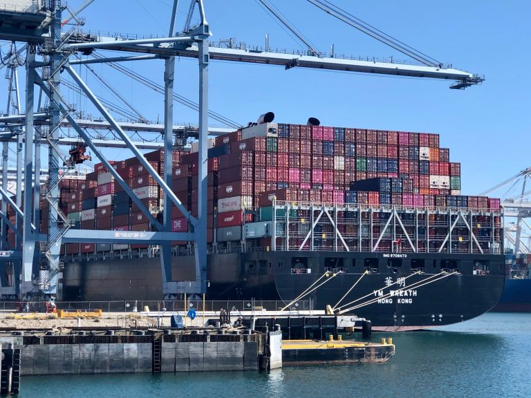 A Hong Kong cargo ship is unloaded in Long Beach harbor.
