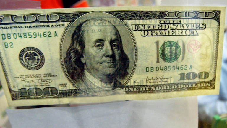 Oddly enough, if you create a map in which the states where $100 goes shortest are blue and the states where $100 goes farthest are red, it almost looks like a fairly typical breakdown of states by political party. (AP Photo/Andy Wong, File)