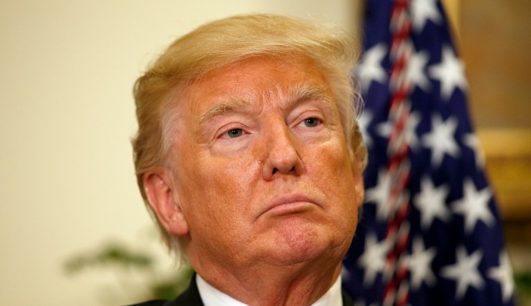 An adviser to Trump said the president is curious about the extent of his pardoning authority. (AP Photo/Alex Brandon)