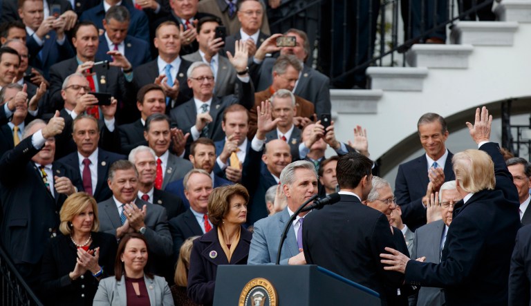 President Trump and congressional Republicans on Wednesday celebrated the final passage of historic tax overhaul legislation. (AP Photo/Evan Vucci)