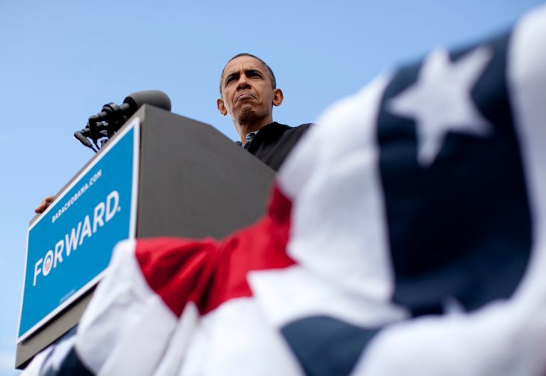President Barack Obama pauses as he speaks during a campaign event at Bayliss Park, Monday, Aug. 13, 2012, in Council Bluffs, Iowa, during a three day campaign bus tour through Iowa. (AP Photo/Carolyn Kaster)