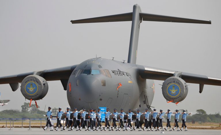 Indian Air Force personnel march during Air Force Day parade at the air force station in Hindon near New Delhi, India, Wednesday, Oct. 8, 2014. (AP Photo/Altaf Qadri)